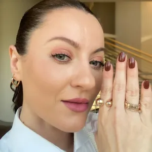 ANEL COM DUAS ESFERAS BANHADO A OURO 18K AJUSTÁVEL