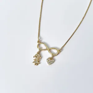 Colar Infinito com menina e coração cravejados em zircônias banhado a ouro 18K