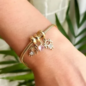 PULSEIRA FILHOS DUAS MENINAS COM CRISTAL ROSA BANHADO A OURO 18K