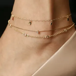 TORNOZELEIRA COM PINGENTE MINI GOTA BANHADO A OURO 18K