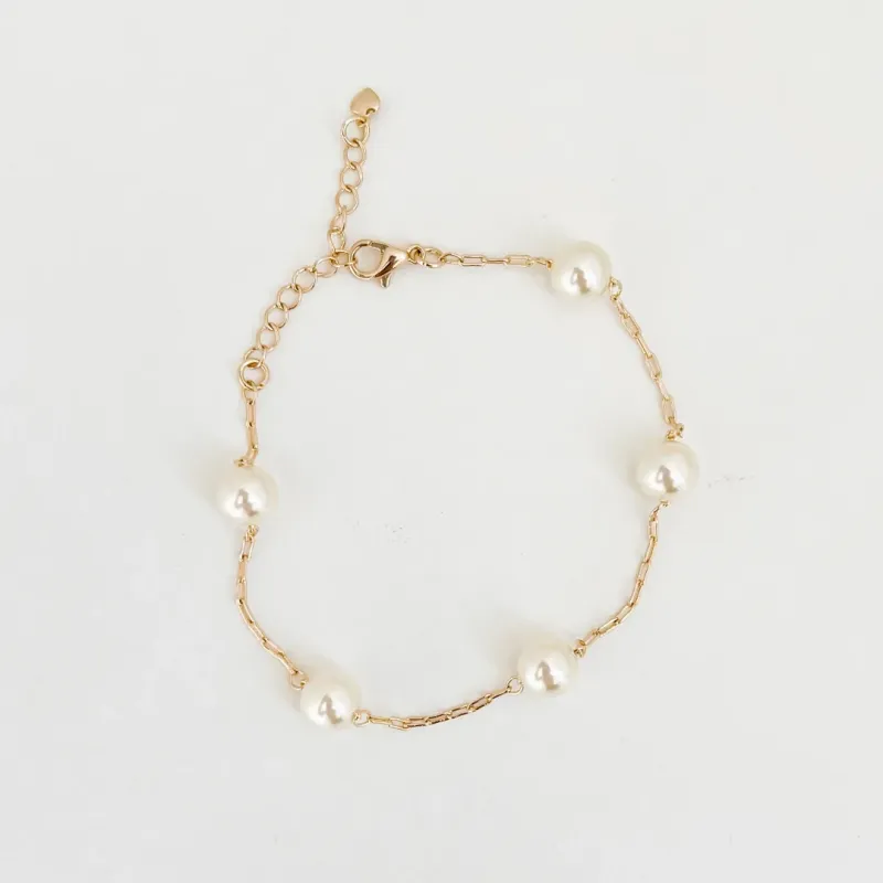 PULSEIRA PÉROLA SHELL 8MM BANHADO A OURO 18K