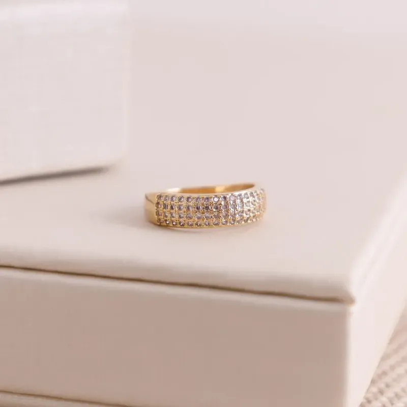 ANEL CRAVEJADO DE ZIRCONIAS 4 FILEIRAS BANHADO A OURO 18K
