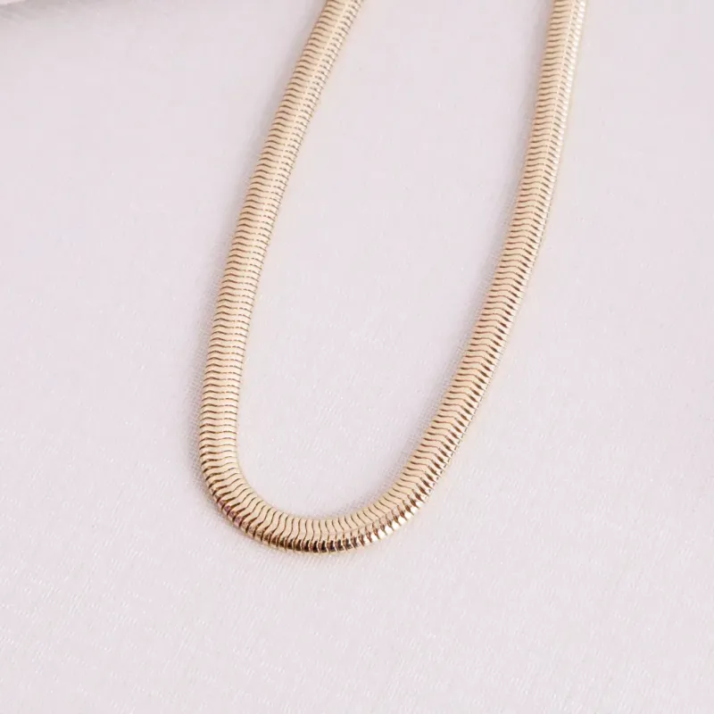 PULSEIRA MALHA SNAKE BANHADO A OURO 18K