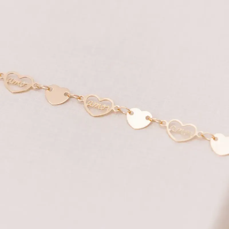 PULSEIRA CORAÇÃO LISO E VASADO AMOR BANHADO A OURO 18K