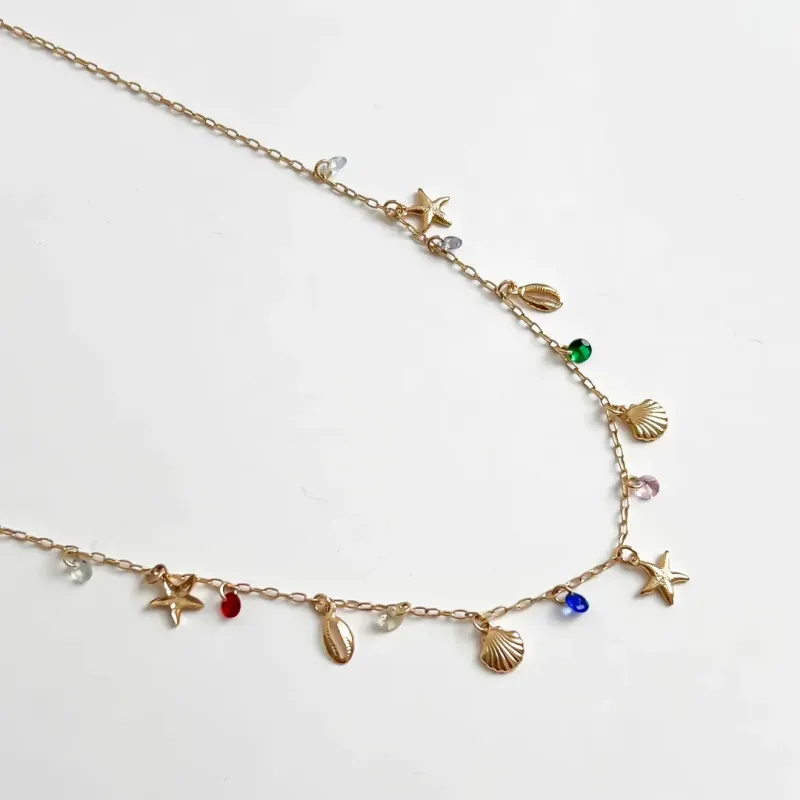 COLAR ESTRELA E CONCHA DO MAR COM CRISTAIS COLORIDO BANHADO A OURO 18 K AJUSTÁVEL 50CM