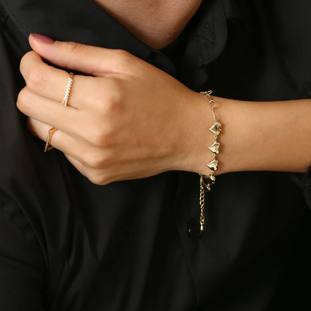 PULSEIRA CORAÇÃO VASADO E LISO BANHADO A OURO 18K