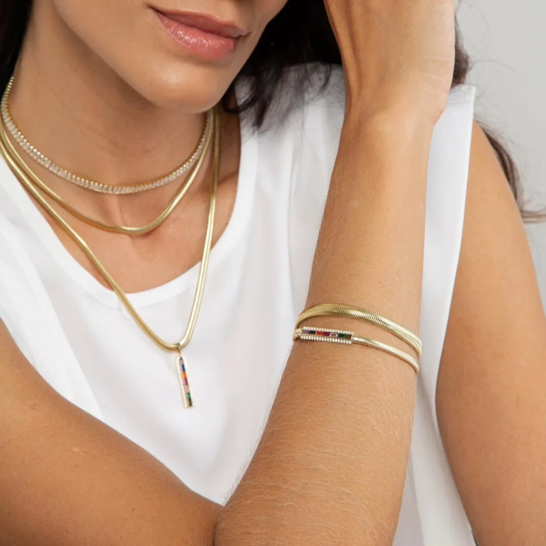 PULSEIRA PALITO COM ZIRCÔNIA BAGUETE COLOR BANHADO A OURO 18K