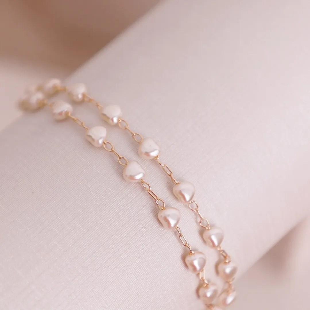 PULSEIRA PÉROLA CORAÇÃO BANHADO A OURO 18K