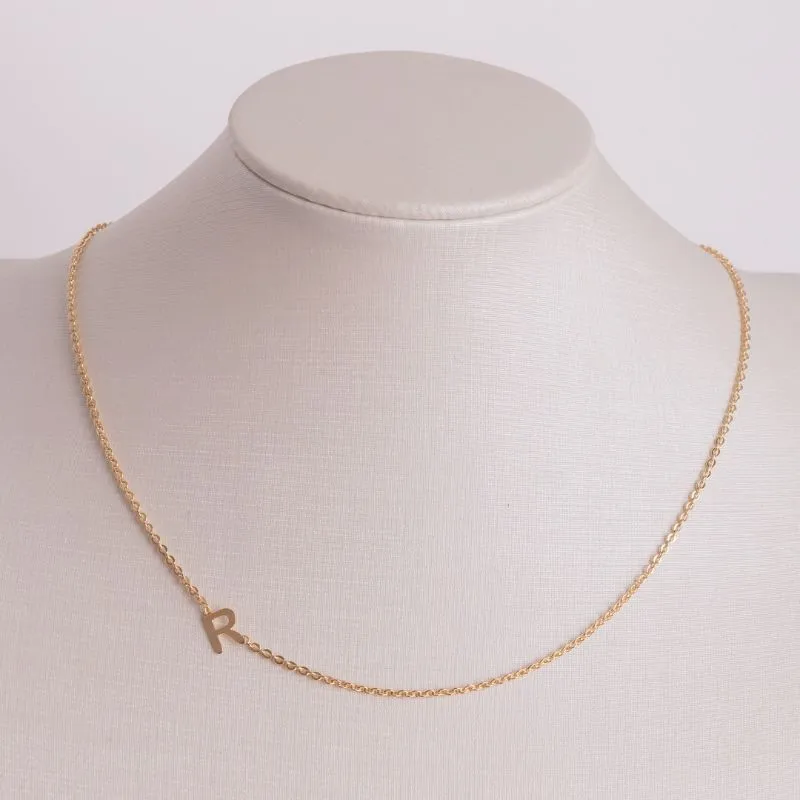 COLAR INCIAL TRANSVERSAL LETRA R BANHADO A OURO 18K 45CM