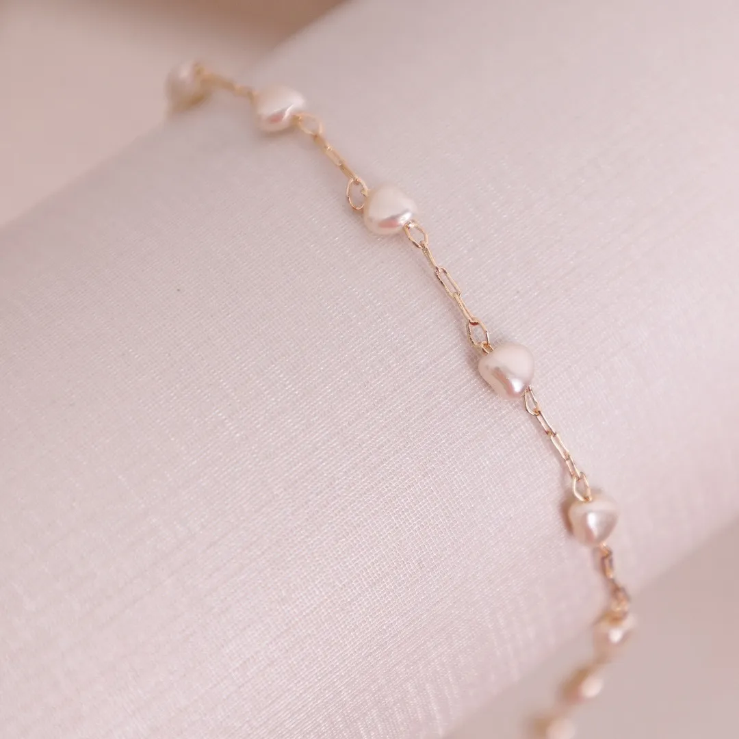 PULSEIRA PÉROLA CORAÇÃO BANHADO A OURO 18K