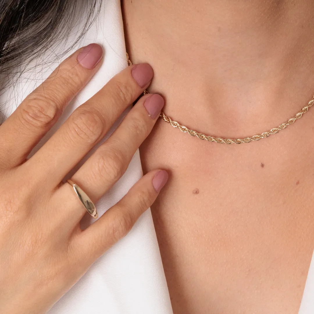 ANEL RETO COM UMA ZIRCONIA BANHADO A OURO 18K