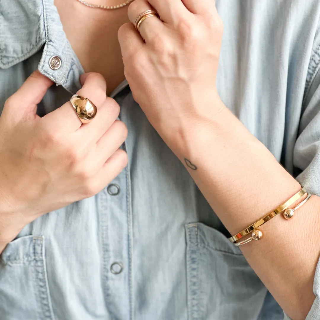 ANEL ABAULADO LISO BANHADO A OURO 18K