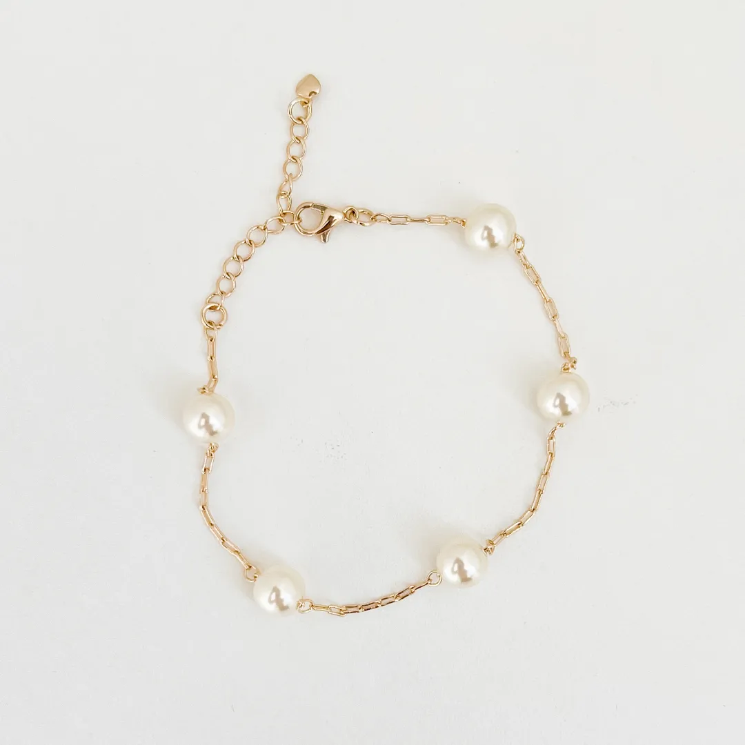 PULSEIRA PÉROLA SHELL 8MM BANHADO A OURO 18K