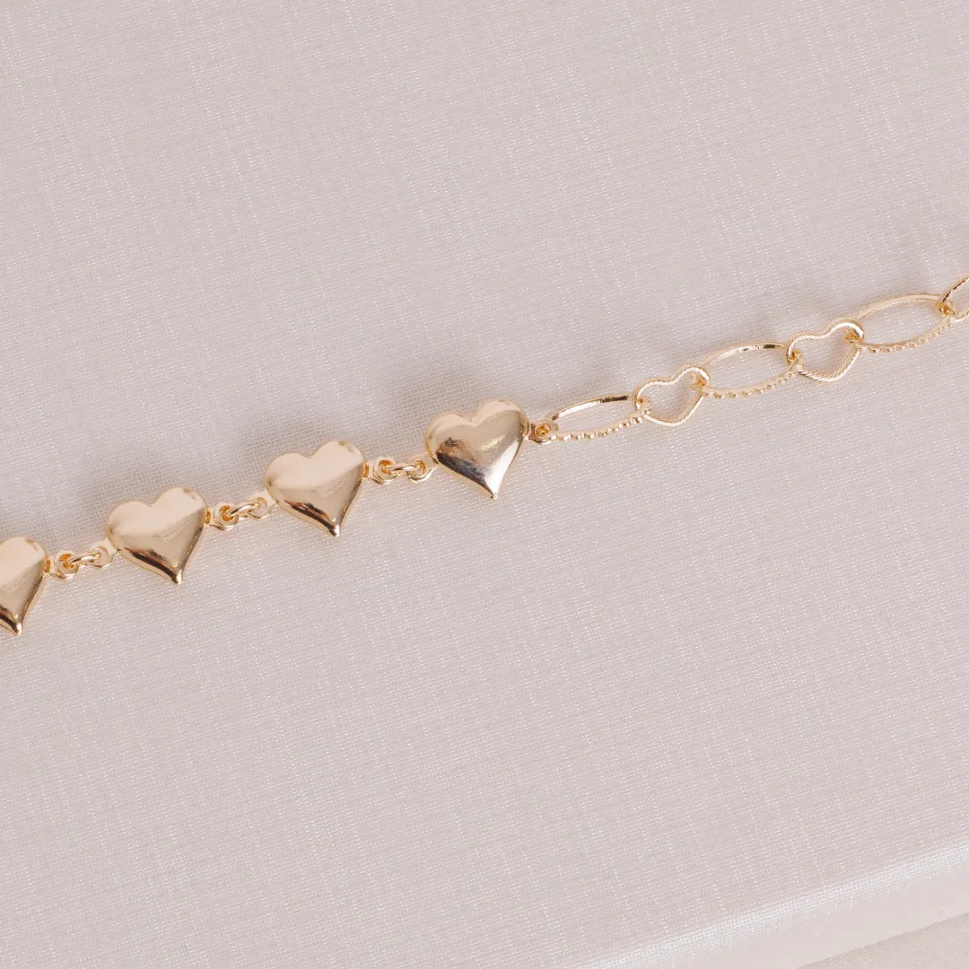 PULSEIRA CORAÇÃO VASADO E LISO BANHADO A OURO 18K