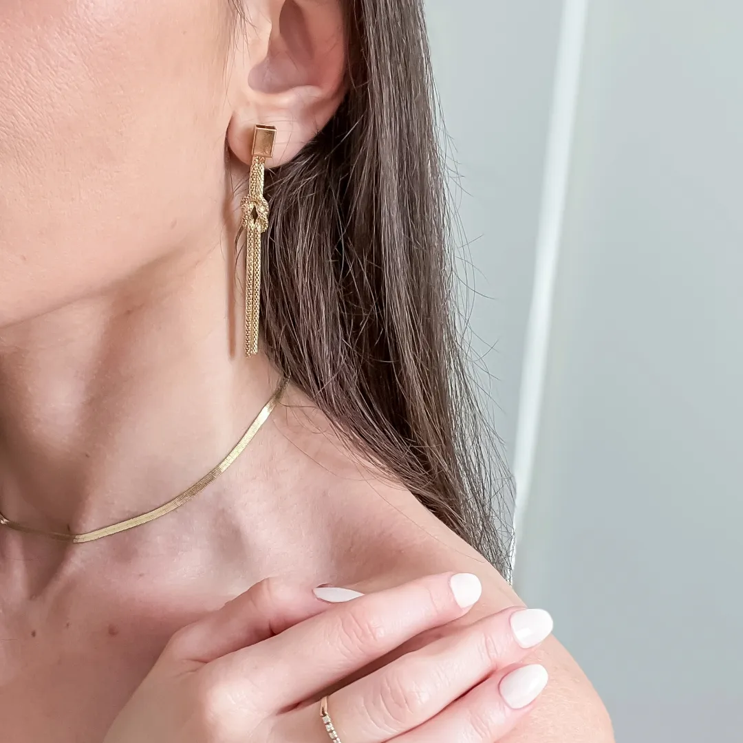 BRINCO NÓ TELINHA BANHADO A OURO 18K