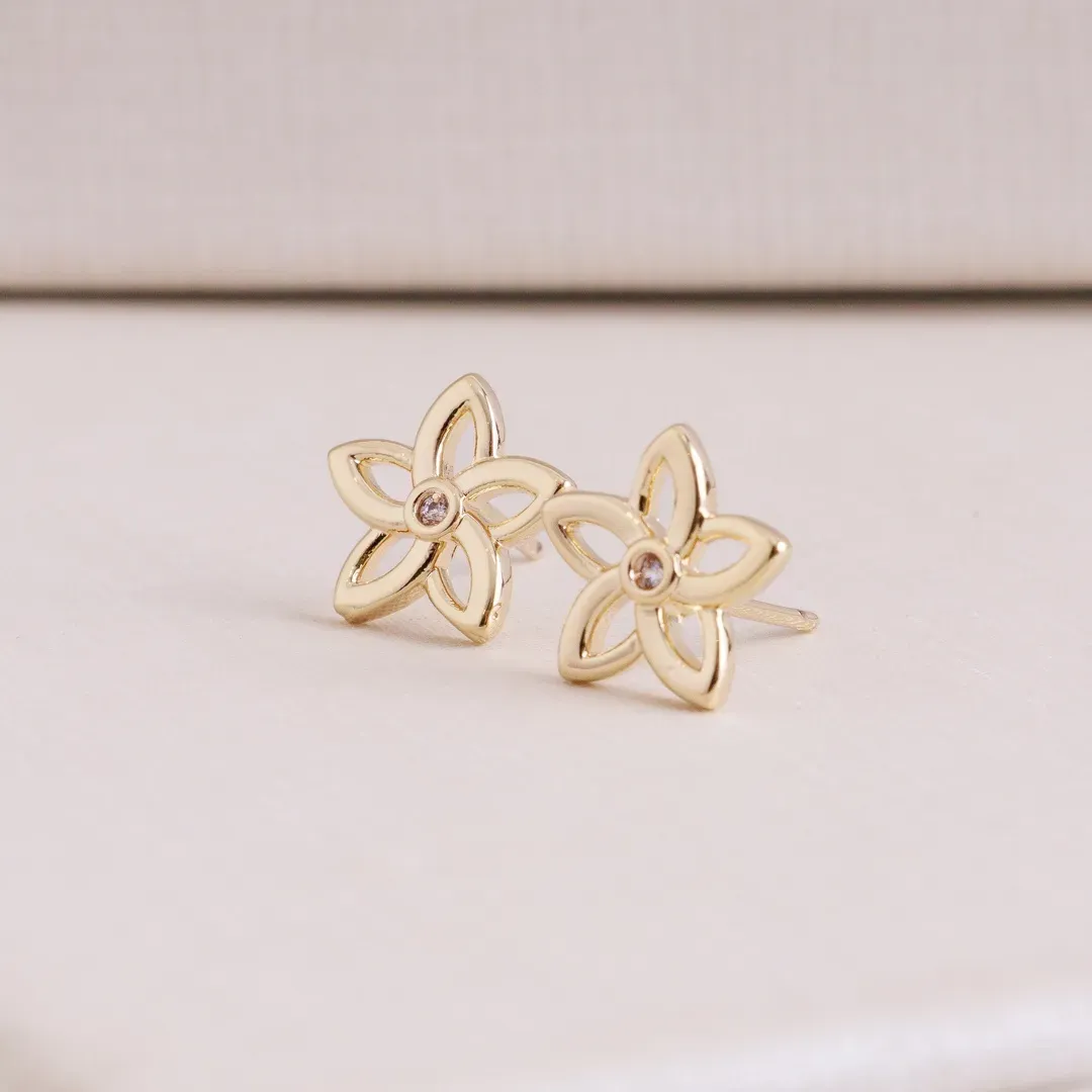 BRINCO FLOR COM UMA ZIRCONIA AO MEIO BANHADO A OURO 18K