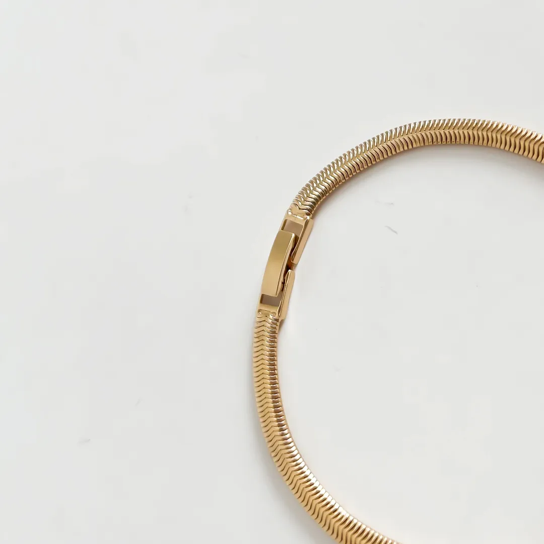 PULSEIRA PALITO COM ZIRCÔNIA BAGUETE COLOR BANHADO A OURO 18K
