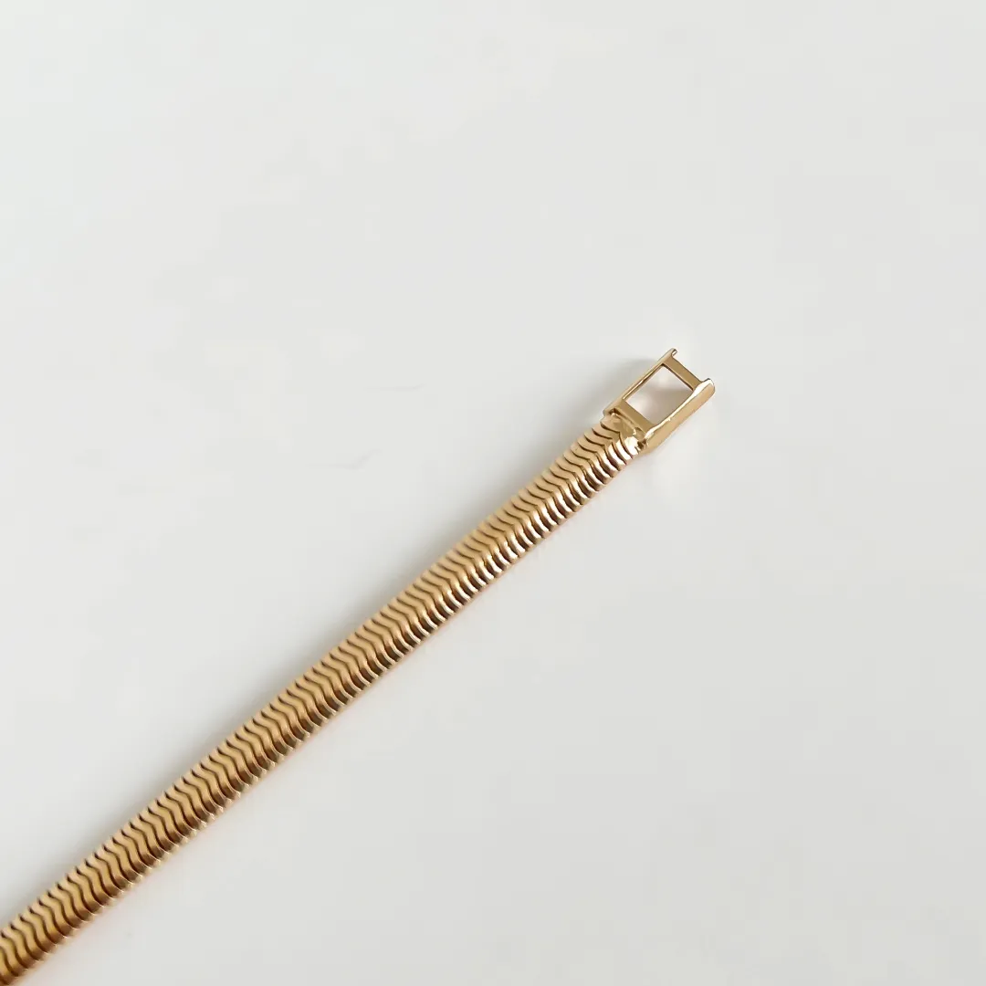 PULSEIRA PALITO COM ZIRCÔNIA BAGUETE COLOR BANHADO A OURO 18K