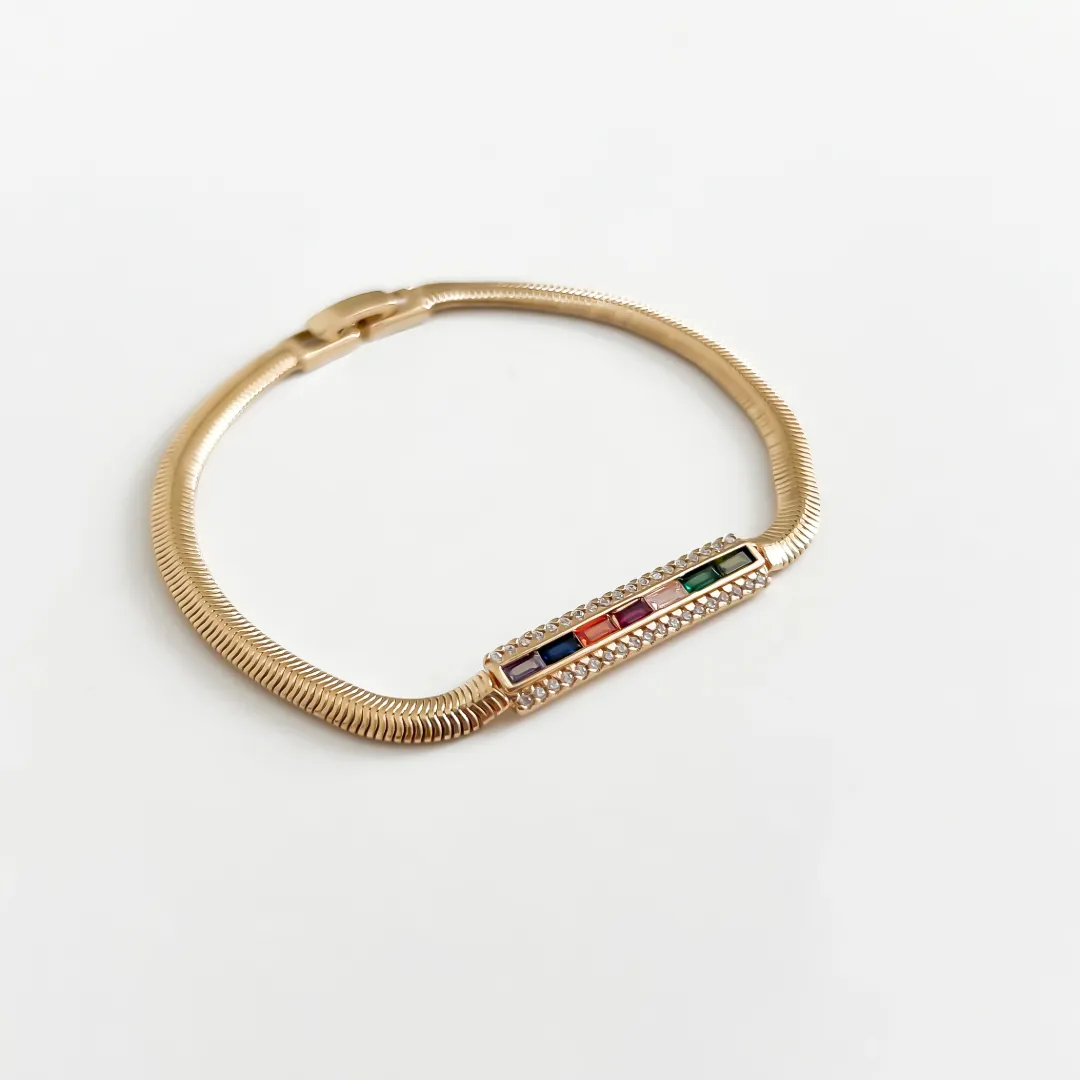PULSEIRA PALITO COM ZIRCÔNIA BAGUETE COLOR BANHADO A OURO 18K