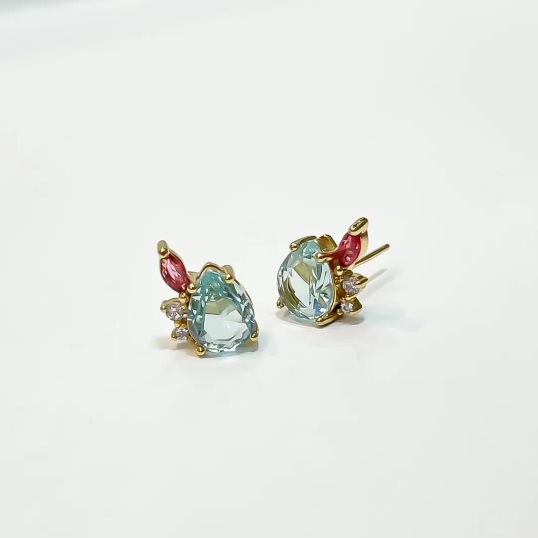 BRINCO CRISTAL AZUL COM ZIRCONIA ROSA BANHADO A OURO 18K