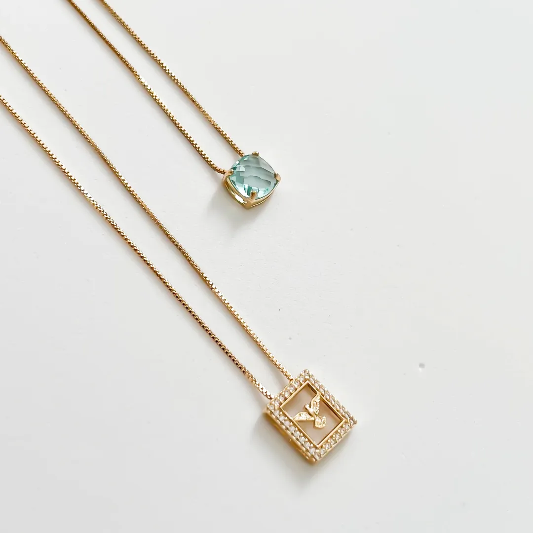 ESCAPULARIO ESPÍRITO SANTO CRAVEJADO COM CRISTAL AZUL CLARO BANHADO A OURO 18K 60 CM