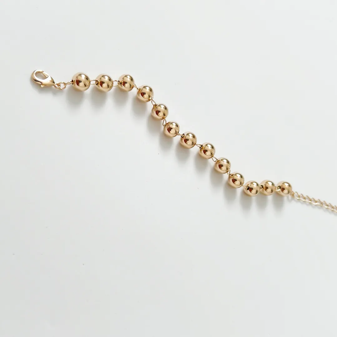 PULSEIRA ESFERAS DOURADA BANHADO A OURO 18K
