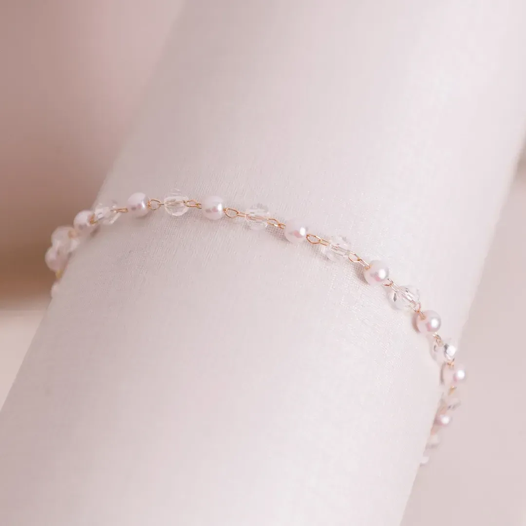PULSEIRA PÉROLA E CRISTAL FACETADO BANHADO A OURO 18K