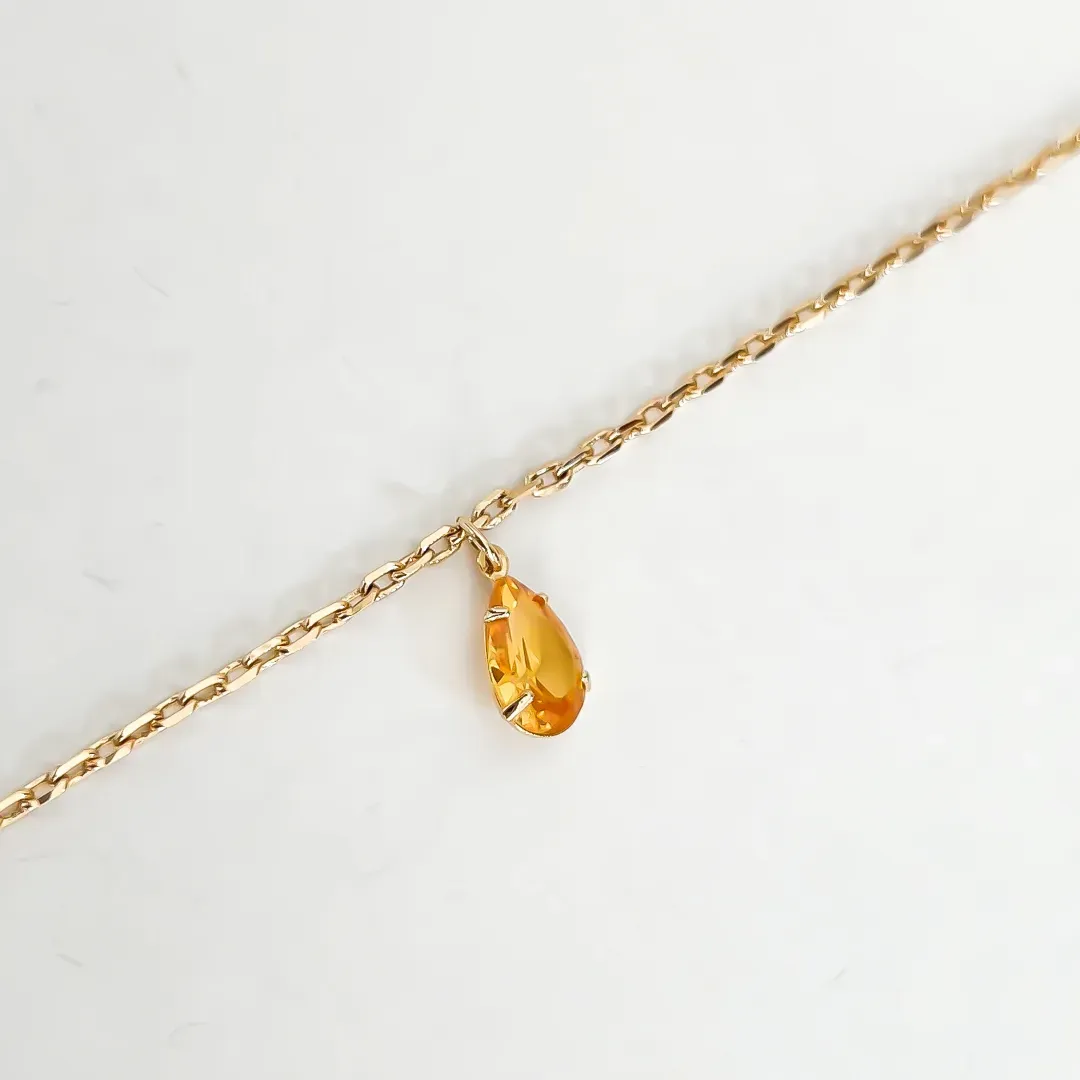 PULSEIRA COM PENDANTE CRISTAL AMARELO BANHADO A OURO 18K