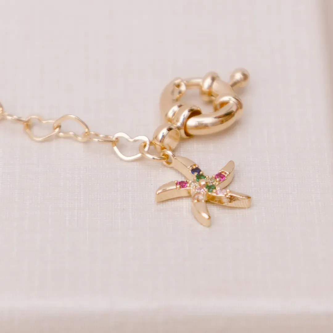 PULSEIRA ELO CORAÇÃO COM ESTRELA DO MAR COLORIDA BANHADO A OURO 18K