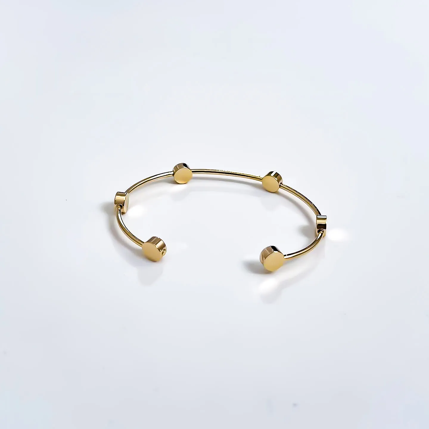 Bracelete Minimalista com formatos de cilindros banhado a ouro 18K