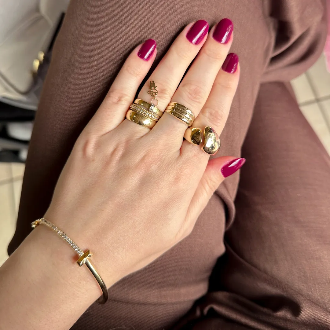 Bracelete liso e cravejado em zirconias banhado a ouro 18k