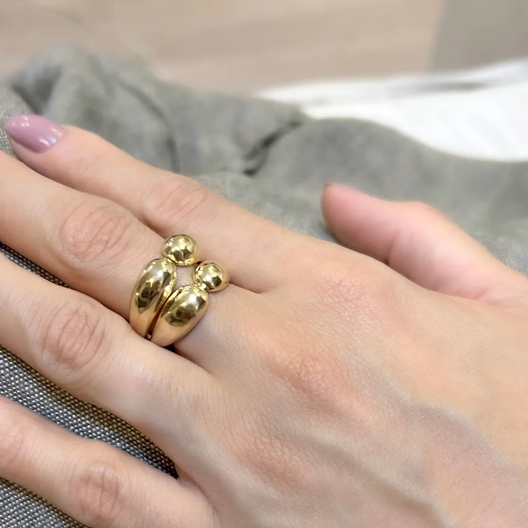 ANEL COM QUATRO ESFERAS BANHADO A OURO 18K AJUSTÁVEL
