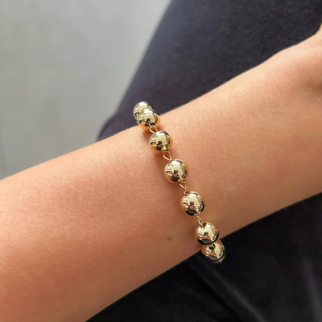 PULSEIRA ESFERAS DOURADA BANHADO A OURO 18K