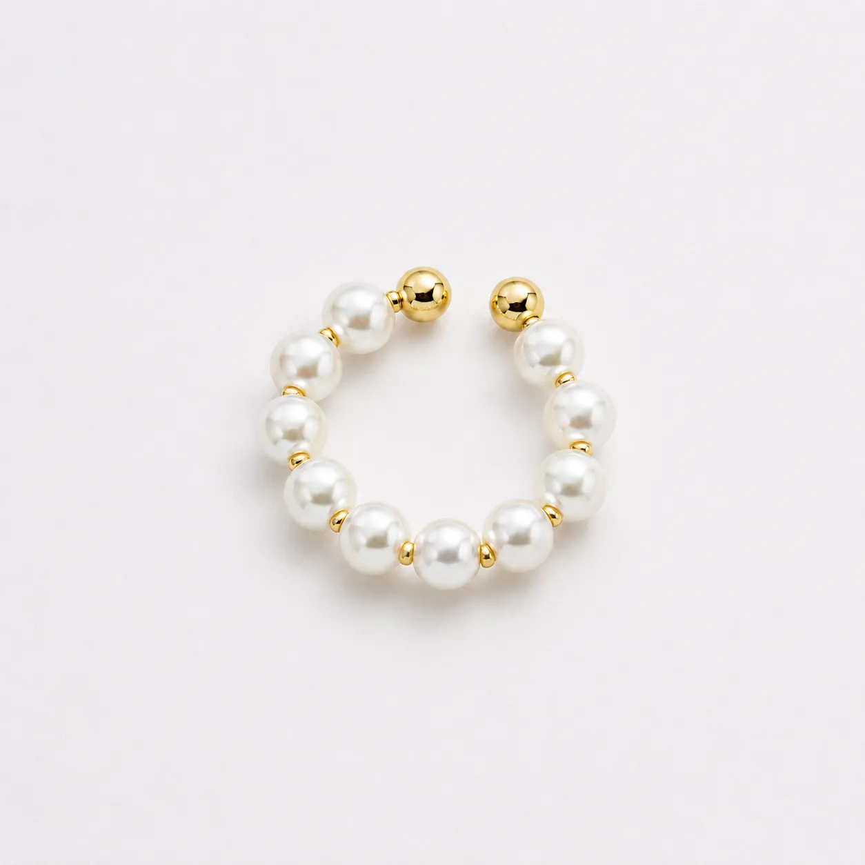 Piercing fake em perolas banhado a ouro 18k